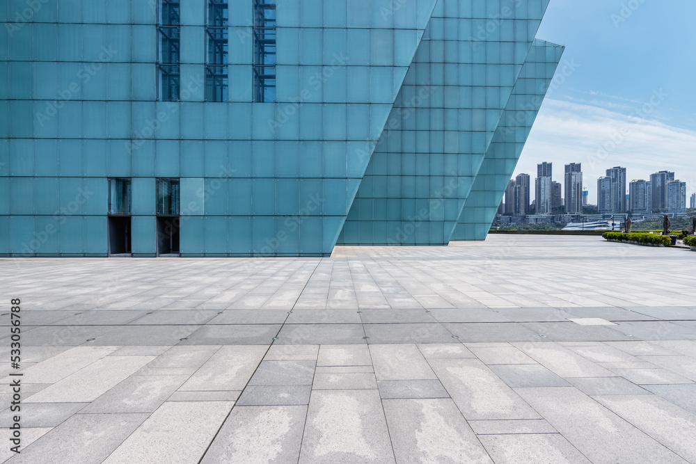 Fototapeta premium empty square floor and modern exterior walls