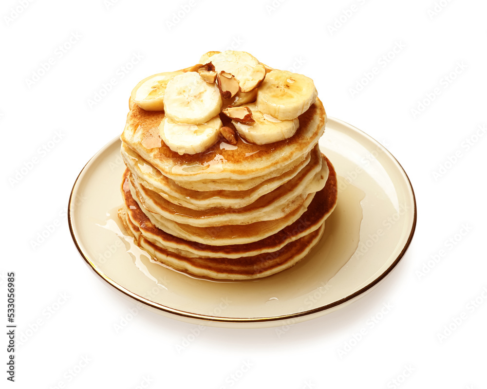 Tasty pancakes with sliced banana isolated on white Tasty pancakes with sliced banana isolated on white