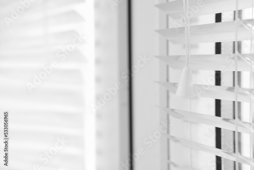 Closeup view of stylish horizontal window blinds