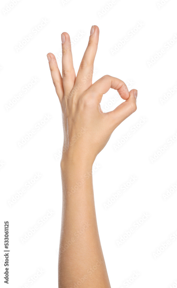 Woman showing okay gesture on white background, closeup of hand Woman showing okay gesture on white background, closeup of hand