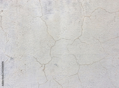 Cracked concrete texture closeup background