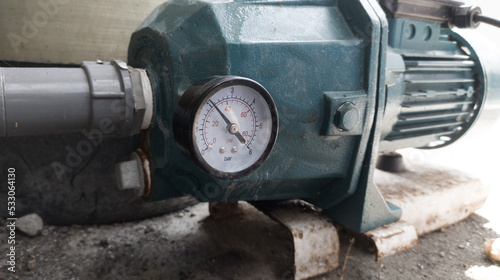 Pressure gauge on the water pressure pump. gauge for measurment water pressure on the pumping.