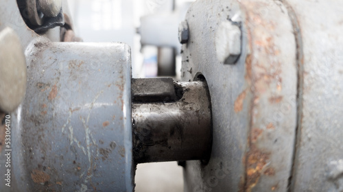 The old pulley wheel with the key slot isolated on a coupler driven pump.