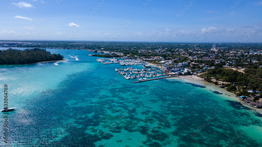 Beautiful aerial view of Boca Chica beach, its turquoise waters, resorts near the Santo Domingo Airport in Dominican Republic