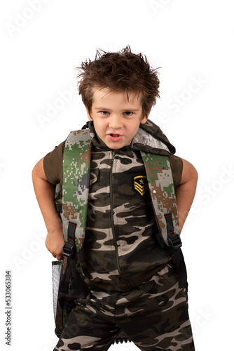 Funny funny shaggy Boy in khaki clothes with a backpack in khaki clothes with a backpack. Tourism, sports and recreation.