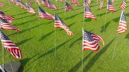 Pepperdine University commemorating Anniversary of 9-11 with annual Waves of Flags Display and memorial ceremony. Drone footage of honoring the lives lost in terror attacks. High quality 4k footage photo