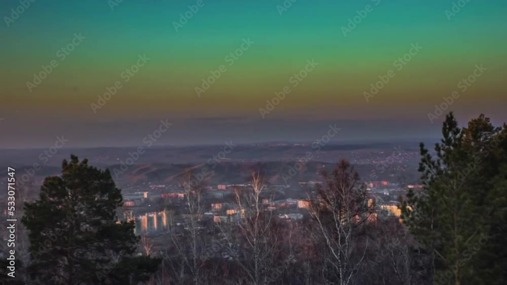 timelapse city behind the forest sunset leaving at dusk timelapse city behind the forest sunset leaving at dusk