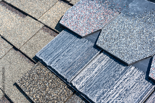 Assorted selection of premium synthetic roof shingles to pick a new style.