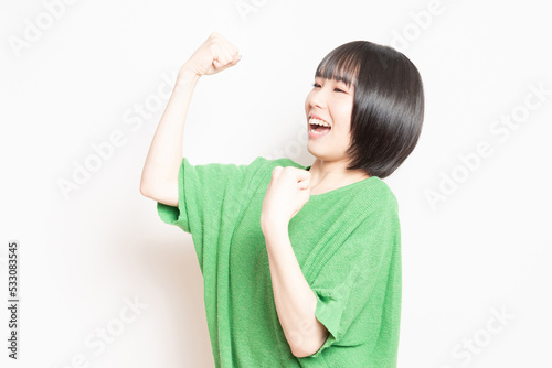Tableau sur toile ガッツポーズをする若い女性