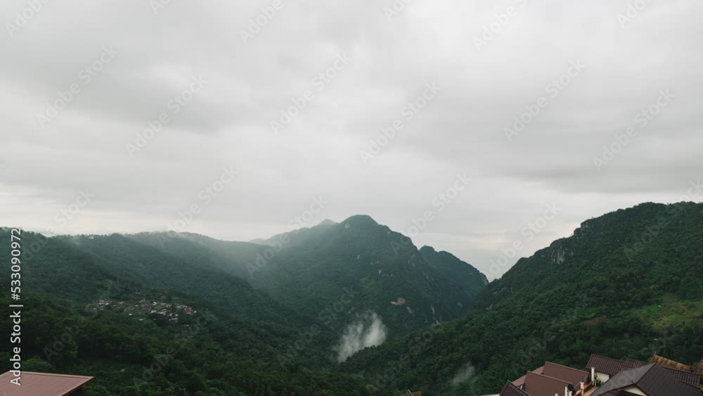 4K view from the top of mountain with mist over mountain time lapse at Doi Pha He,Chiang rai,Thailand 4K view from the top of mountain with mist over mountain time lapse at Doi Pha He,Chiang rai,Thailand