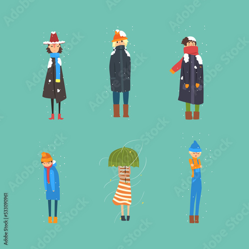 Frozen people walking in cold winter weather set vector illustration