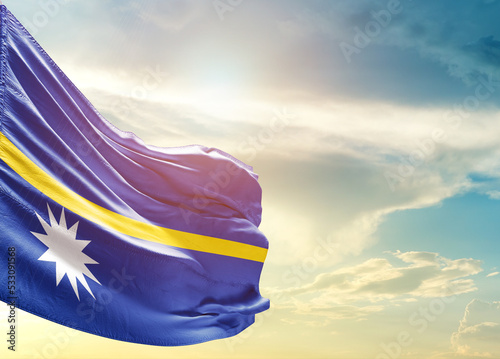 Nauru national flag cloth fabric waving on the sky - Image photo