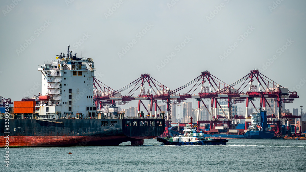 Dock cranes loading containers, trade port, shipping