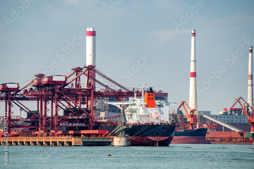 Dock cranes loading containers, trade port, shipping