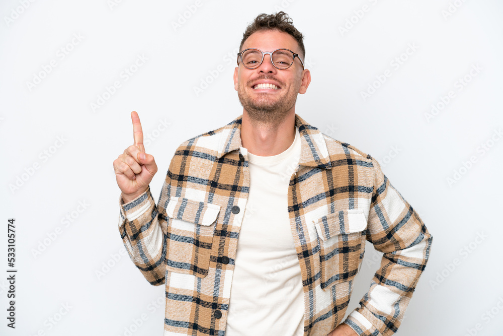Young caucasian handsome man isolated on white background showing and lifting a finger in sign of the best Young caucasian handsome man isolated on white background showing and lifting a finger in sign of the best