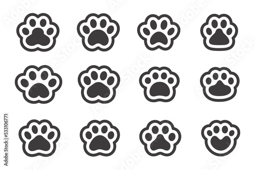 Dog and cat paws with sharp claws. cute animal footprints