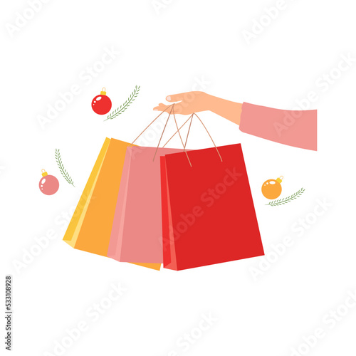 Woman's hand holding paper shopping bags. Christmas holiday time. White background. Vector illustration. Flat style