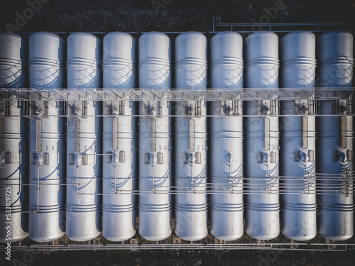 Aerial top view of fuel storage tanks.