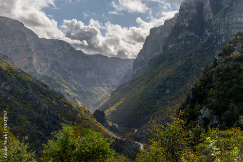 view of  Vikos Gorge, the deepest gorge in Europe, with fall colors near vikos village in Zagori Epirus, Greece. photo