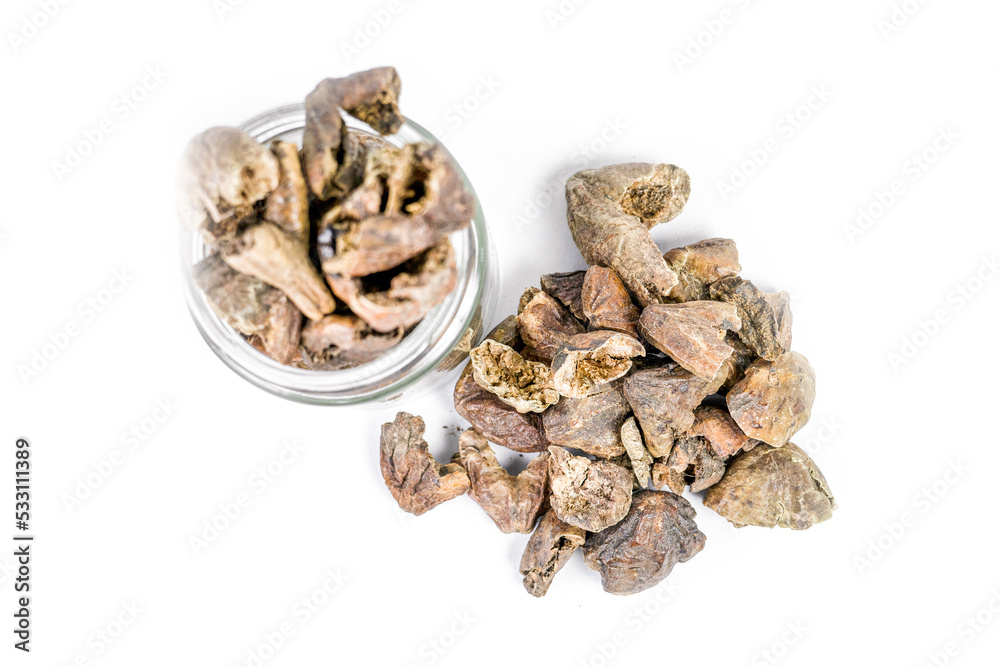 Pile of Organic Chebulic Myrobalan or Choti Harad or Terminalia chebula isolated on white background Pile of Organic Chebulic Myrobalan or Choti Harad or Terminalia chebula isolated on white background