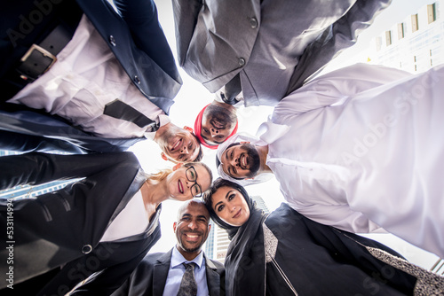 Slika na platnu Multiracial corporare business team meeting for a deal in Dubai - Multicultural