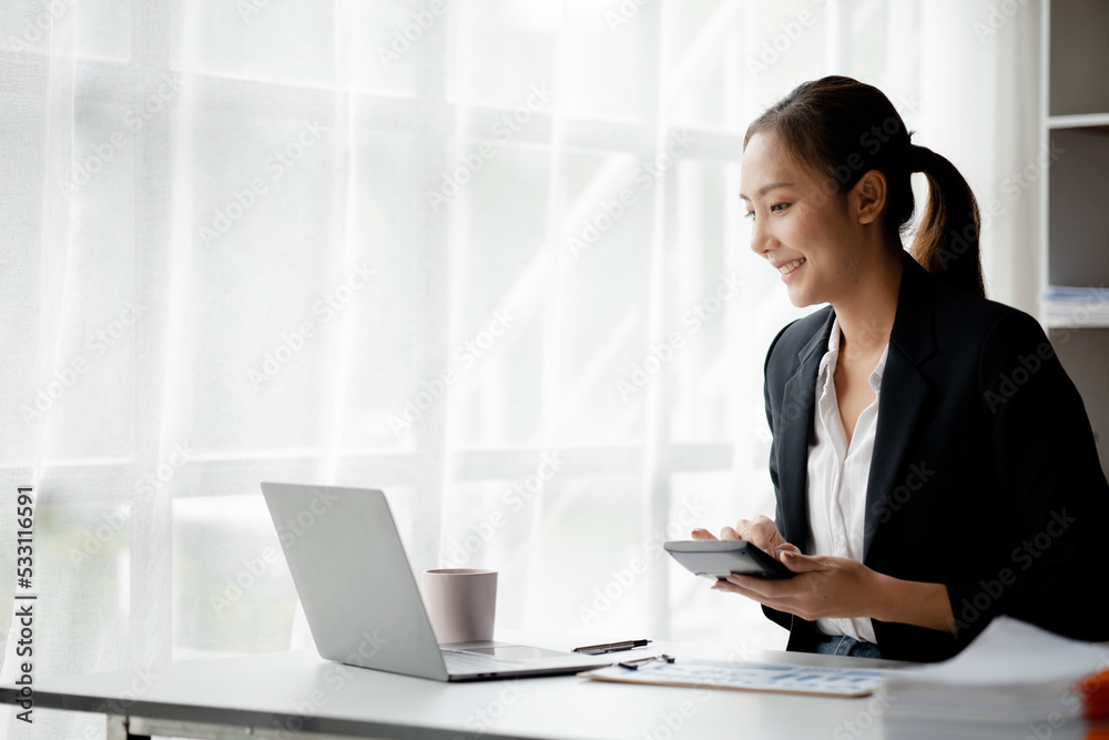 Asian women working in the office, young Asian business women as business executives, founding and running start-up executives, young female business leaders. Startup business concept. Asian women working in the office, young Asian business women as business executives, founding and running start-up executives, young female business leaders. Startup business concept.