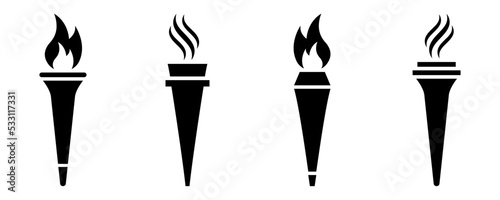 Set of torch and flame vector icons. Torch and fire black silhouette. Olympic symbol. Vector 10 EPS.