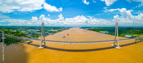 Vam Cong bridge, Dong Thap, Vietnam, aerial view. Vam Cong bridge connects Dong Thap and Can Tho provinces in the Mekong delta, Vietnam.