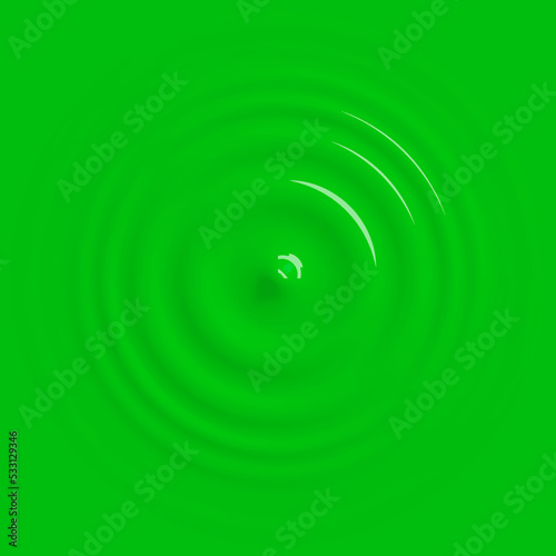 Green paint drop falling on surface background
