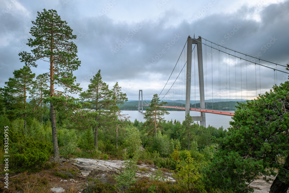 Hogakustenbron, suspension bridge in the High Coast area in Sweedn on a cloudy day. Hoga Kusten trail starting point.