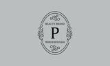 Premium monogram with the letter P. Frame with ornament. Luxury logo design with minimal modern font.