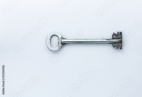 Old key isolated on white background. © Rafal Rutkowski