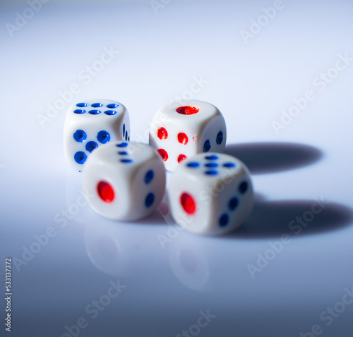 four game dice isolated on white background