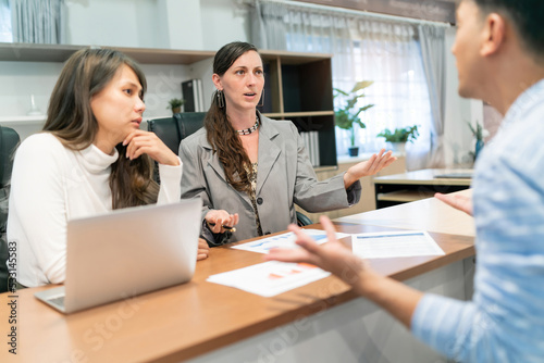 business caucasian and asian woman interview. annoyed human resource from industry having interview with employee candidate but disappointed. a new recruitment argument with uncomfortable employer