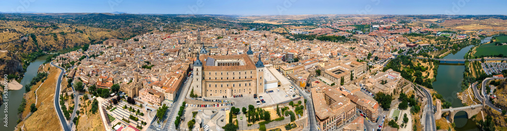 A panoramic aerial view of Toledo with the Alcazar fortress and Tagus River