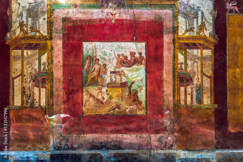 Pompeii, Italy Triclinium Roman House of Siricus ancient colourful fresco painting on the wall portraying Drunken Hercules.