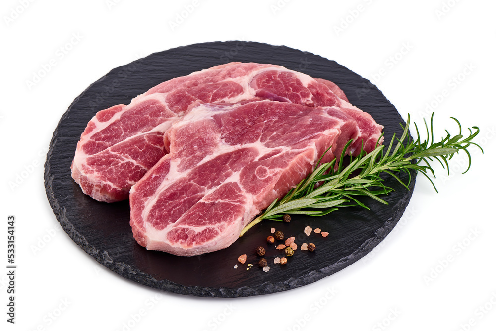 Pork shoulder steaks, isolated on white background.