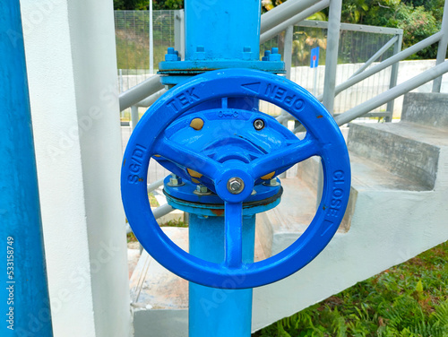 JOHOR, MALAYSIA -AUGUST 1, 2022: Pipe valve is used to control the quantity of water or liquid passing through a pipe. This valve is also used for pipe connections.