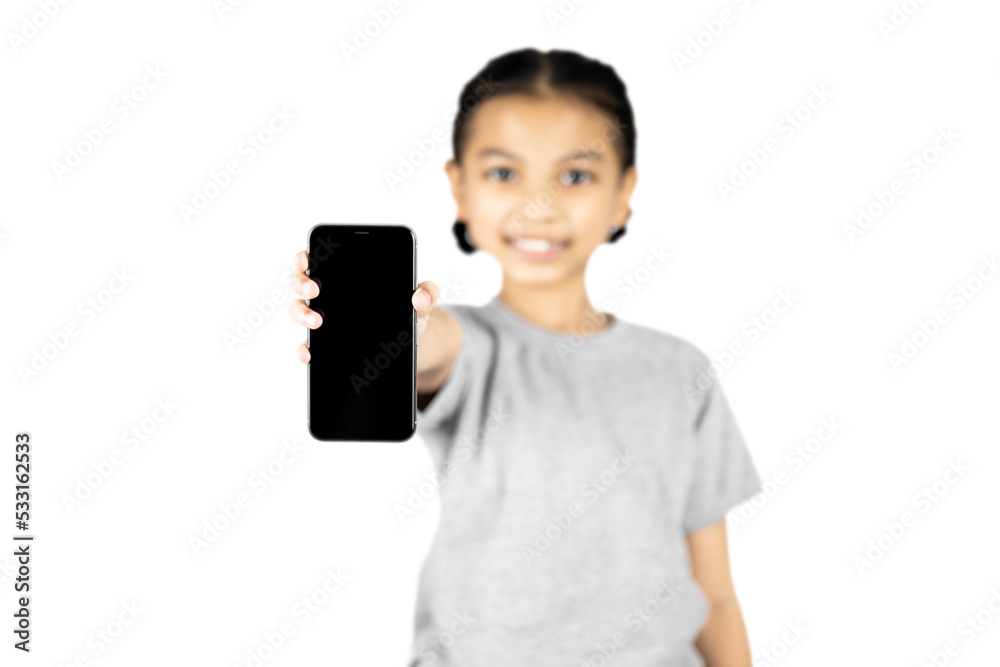 A little Asian girl showing blank screen mobile phone isolated on white background with clipping path. A little Asian girl showing blank screen mobile phone isolated on white background with clipping path.