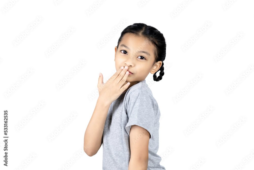 Little Asian girl covered her mouth with her right hand isolated on white background with clipping path. Little Asian girl covered her mouth with her right hand isolated on white background with clipping path.