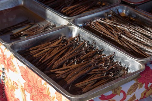 A photo of vanilla sold at market