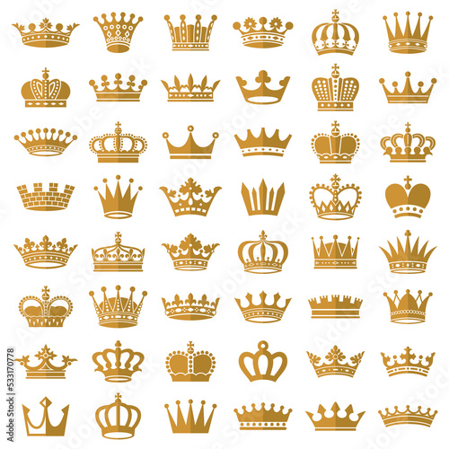 Gold crown icons. Queen king golden crowns luxury royal on blackboard. photo