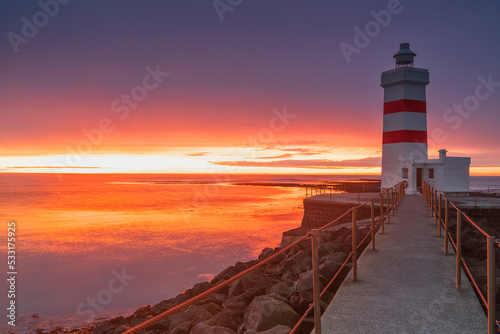 The Old Gardur Lighthouse is located in Iceland on the northern point of the Reykjanes Peninsula.