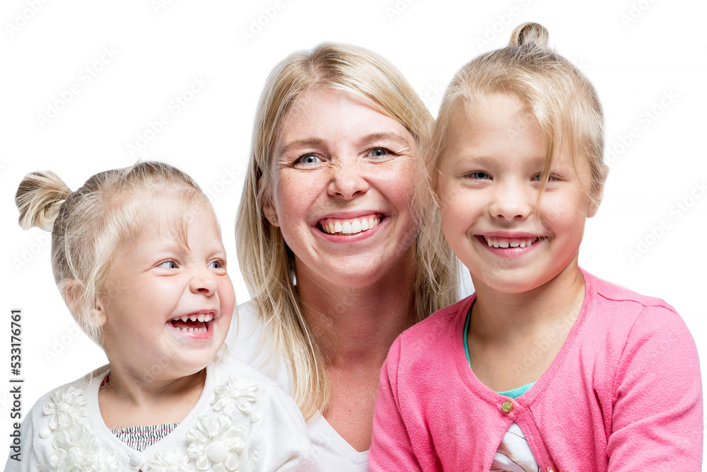 A young mother with two little daughters are hugging and laughing. Love and tenderness. Isolated on white background. A young mother with two little daughters are hugging and laughing. Love and tenderness. Isolated on white background.