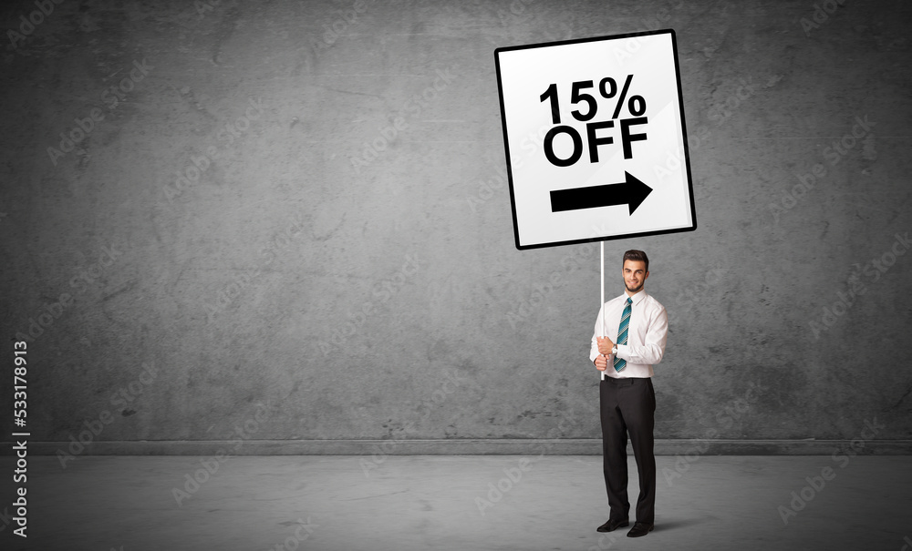 business person holding a traffic sign concept business person holding a traffic sign concept