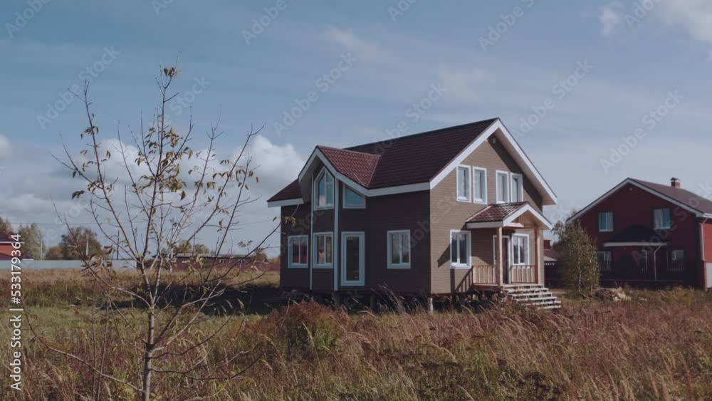 Aerial photography of a new house in a Russian village, newly built private house, construction of houses Aerial photography of a new house in a Russian village, newly built private house, construction of houses