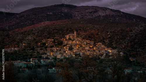 Eus à la tombée du jour, catalan village in the mountains at sunset