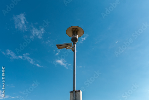 Obraz na płótnie CCTV Cameras against the blue sky. Designed for visual control or automatic image analysis (automatic face recognition). w salonie