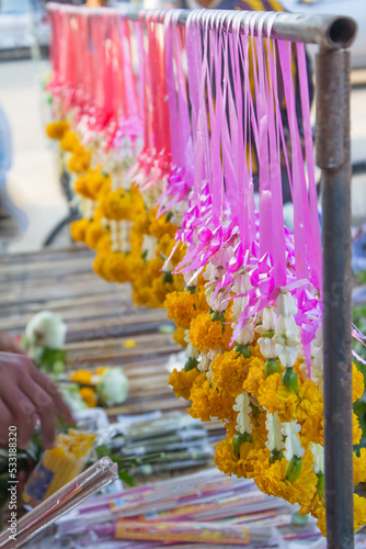  Flower garlands shop with crown flower and Marigold for worship Buddhism © Nulekkk
