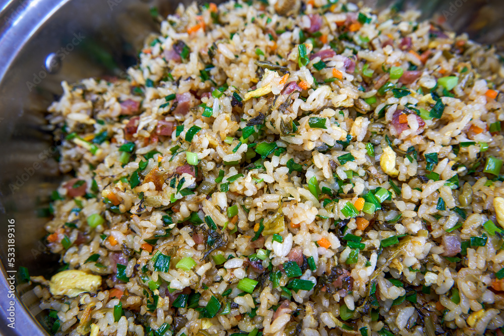A bowl of delicious and tempting Chinese fried rice A bowl of delicious and tempting Chinese fried rice
